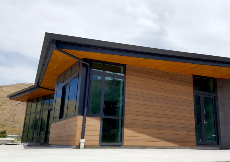 View of a wooden finished building on an overcast day