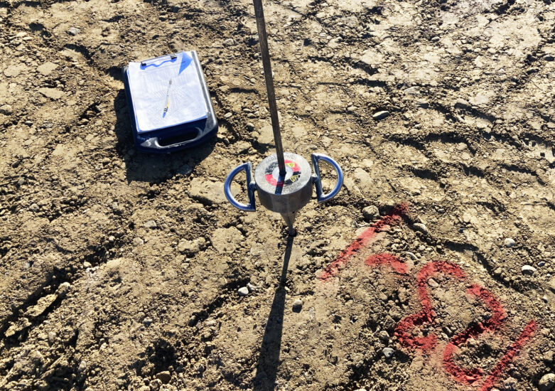 Photo of geotechnical investigation equipment on dry soil
