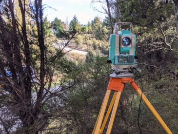 View of surveying equipment in rugged bush