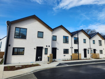 View of new housing development with blue sky background