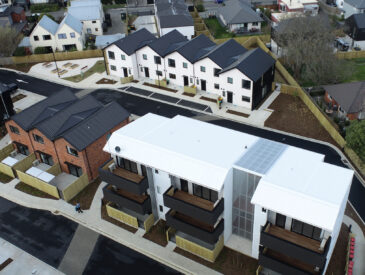 Aerial view of new community housing project - mix of buildings